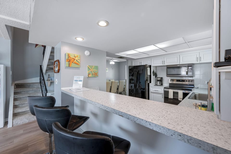 Breakfast bar with barstools