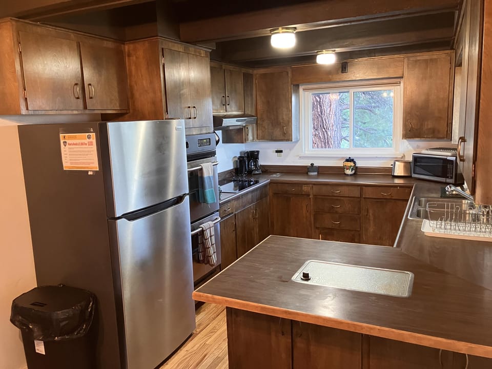 Fully-equipped kitchen with modern appliances and ample counter space.