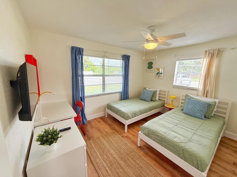 Room with two comfortable twin beds.