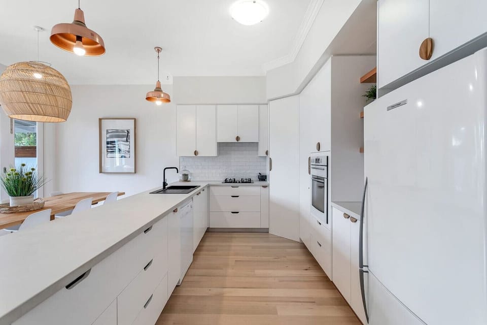 Cook with ease in the modern kitchen, complete with quality appliances and generous bench space.