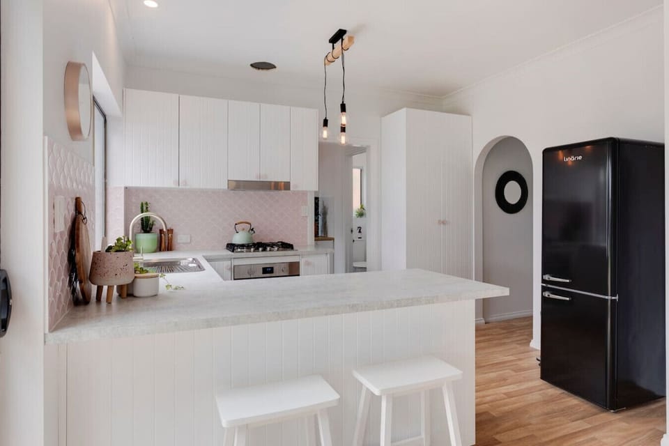 Cook with ease in the bright kitchen, where simple mornings and relaxed meal prep set the tone for the day ahead.