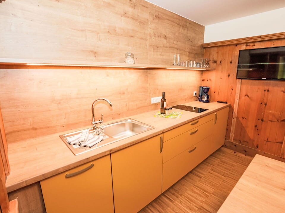 Countertop, Flooring, Wood, Kitchen, Sink, Floor, Cabinetry, Plumbing Fixture, Interior Design, Tap