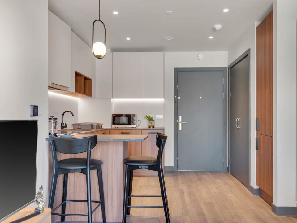 Furniture, Interior Design, Countertop, Wood, Flooring, Kitchen, Floor, Cabinetry, Kitchen & Dining Room Table, Chair