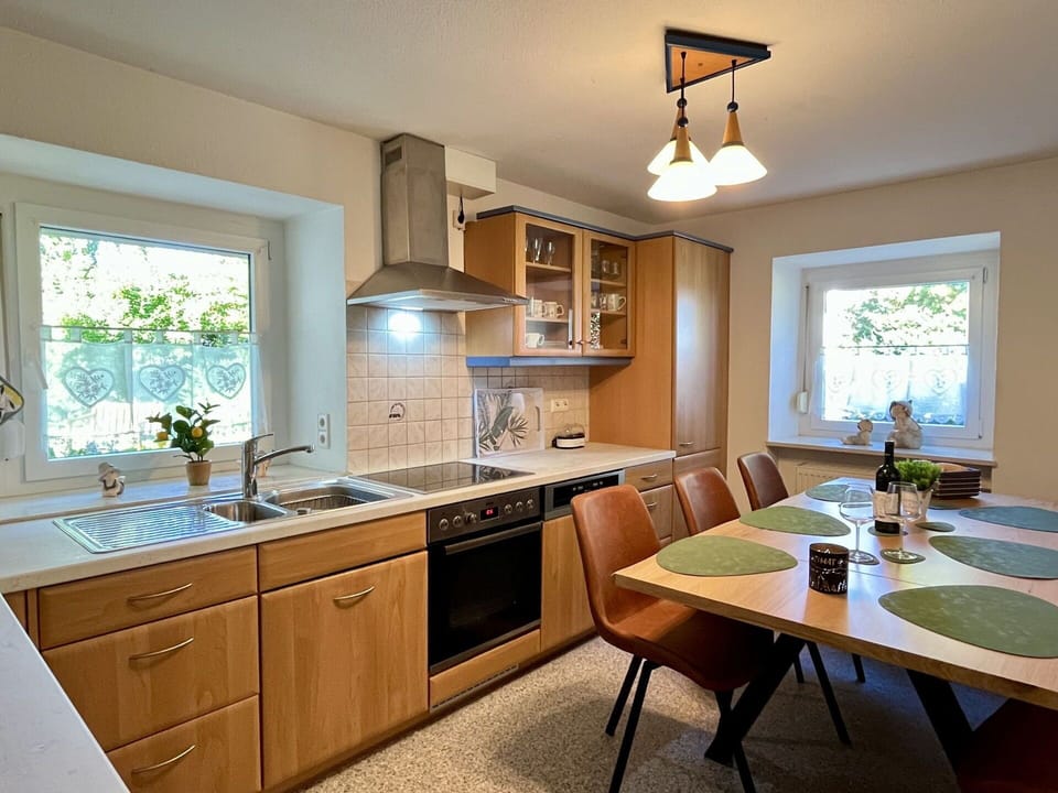 Furniture, Kitchen, Countertop, Interior Design, Kitchen Appliance, Wood, Cabinetry, Ceiling, Flooring, Light Fixture