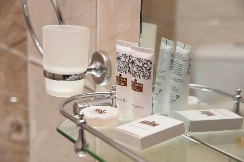 Deluxe Double Room, City View | Bathroom | Shower, slippers, towels, soap