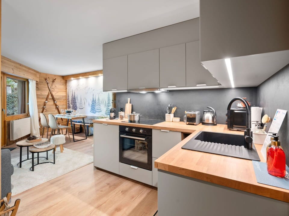 Furniture, Kitchen, Interior Design, Countertop, Kitchen Appliance, Flooring, Wood, Cabinetry, Home Appliance, Major Appliance