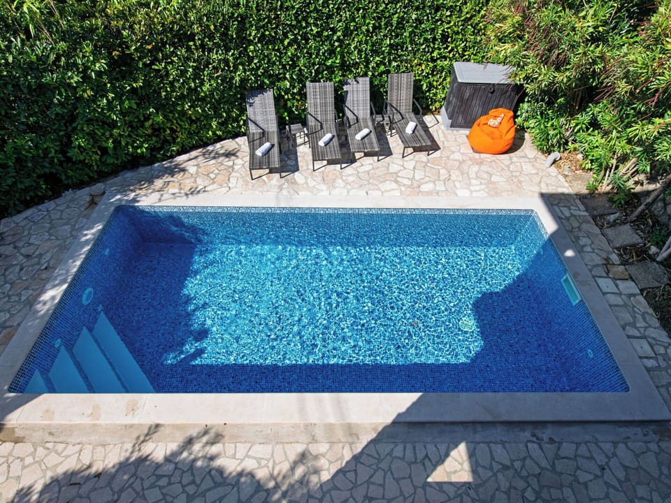 Blue, Swimming Pool, Composite Material, Water Feature, Tile, Flagstone, Resort, Outdoor Furniture, Backyard, Hotel