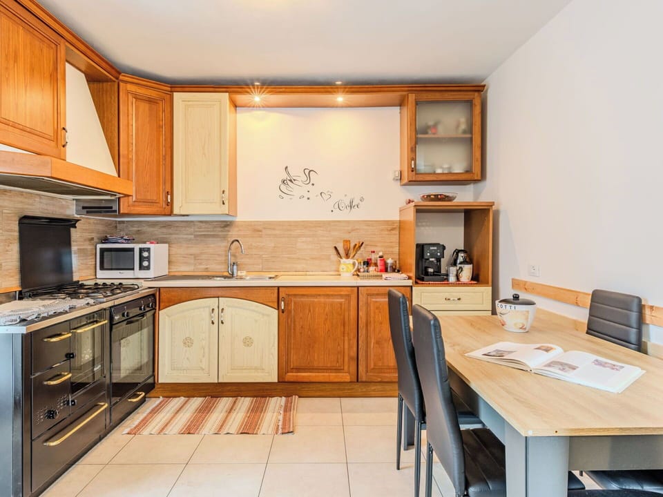 Furniture, Kitchen, Cabinetry, Countertop, Interior Design, Wood, Flooring, Kitchen Appliance, Major Appliance, Room