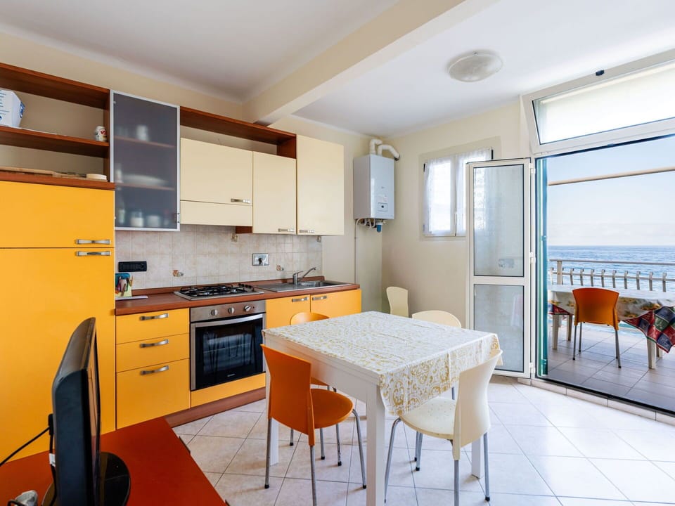 Interior Design, Floor, Apartment, Flooring, Room, Wood Stain, Balcony, Chair, Hardwood, Cabinetry