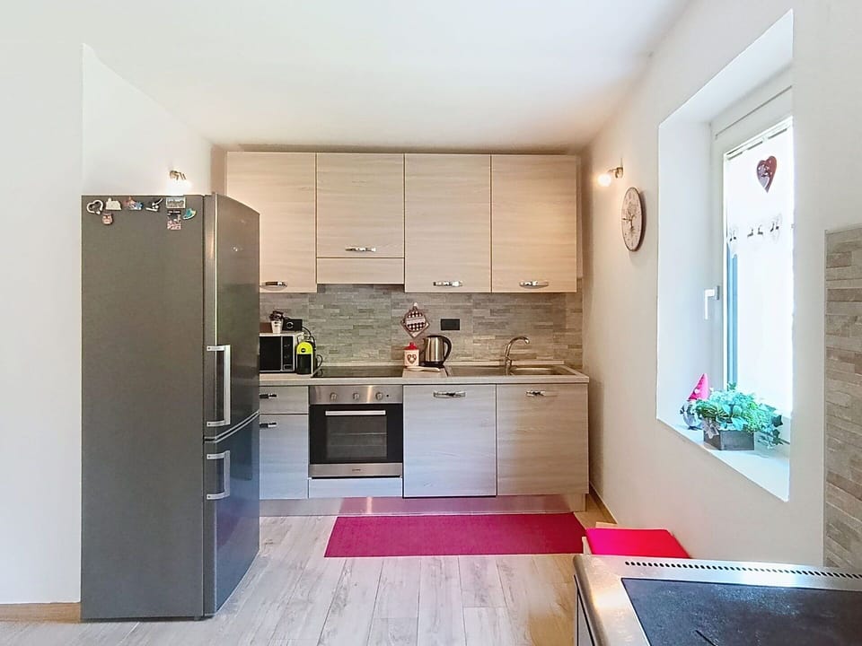 Kitchen, Kitchen Appliance, Furniture, Countertop, Major Appliance, Flooring, Interior Design, Cabinetry, Wood, Floor