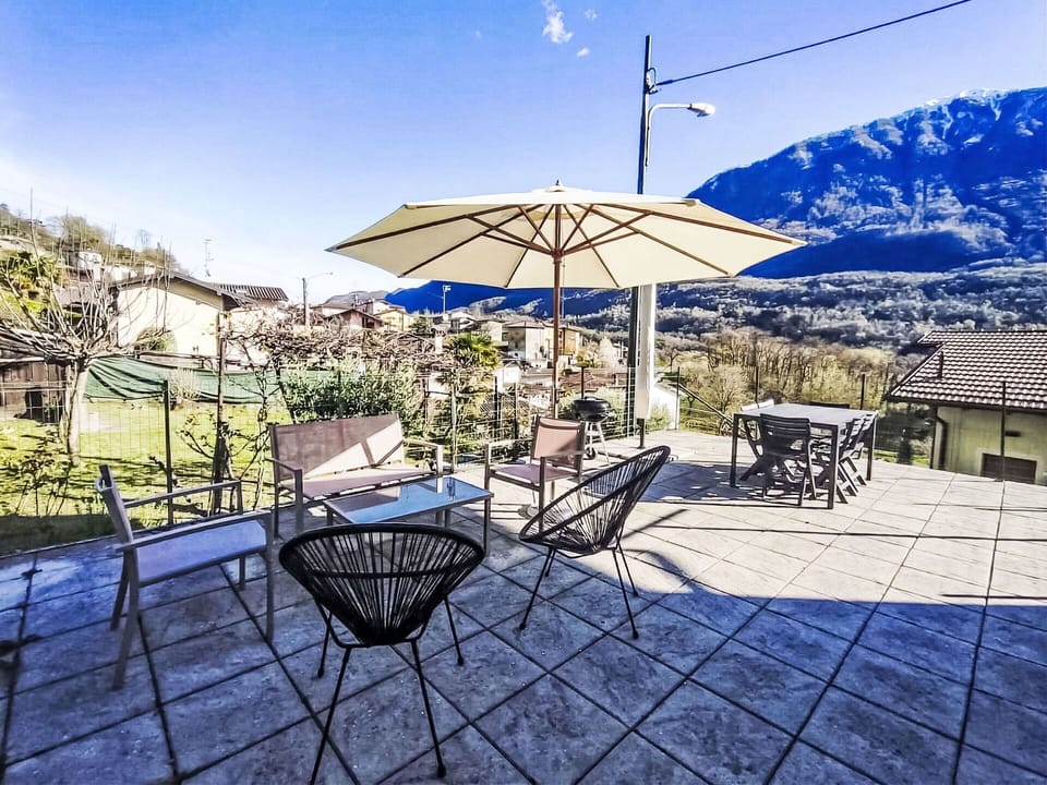 Furniture, Outdoor Furniture, Chair, Outdoor Table, Mountain Range, Umbrella, Shade, Kitchen & Dining Room Table, Restaurant, Eco Hotel