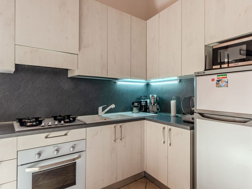 Kitchen Appliance, Kitchen, Countertop, Major Appliance, Kitchen Stove, Cabinetry, Home Appliance, Stove, Interior Design, Furniture