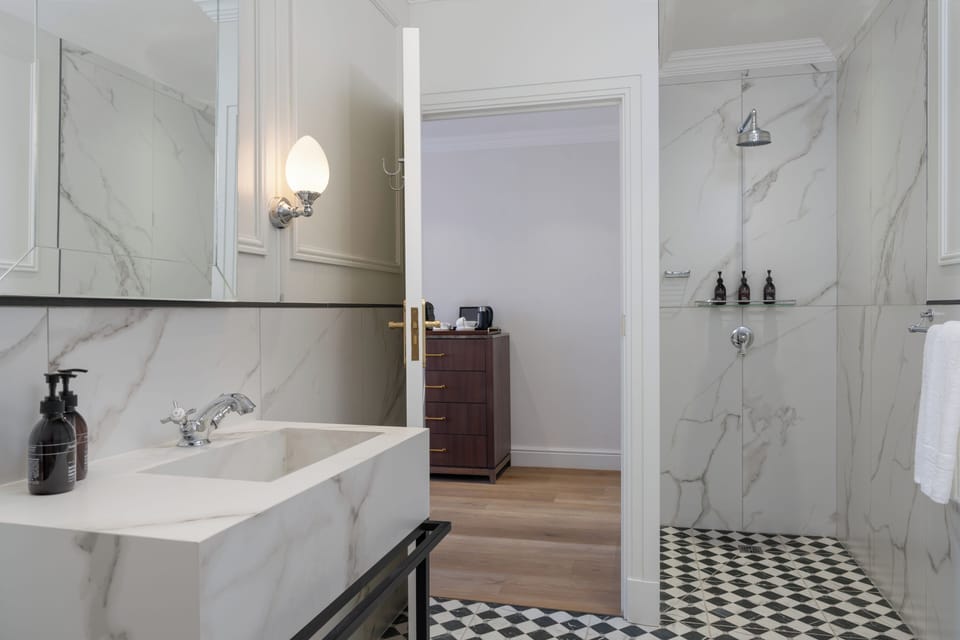 Separate tub and shower, hair dryer, towels, soap