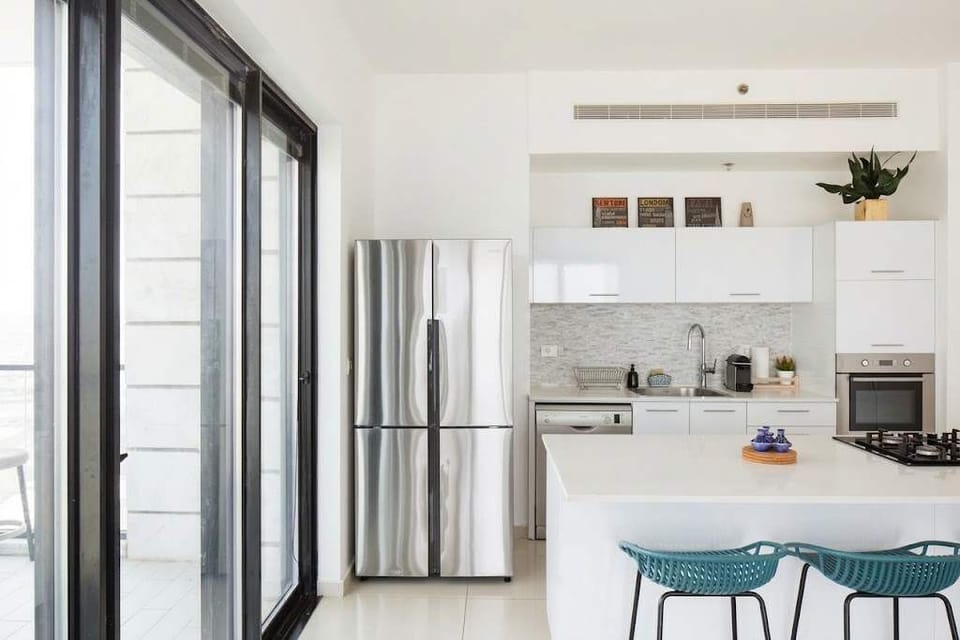 Kitchen island seating makes mornings easy before heading out to explore nearby attractions.
