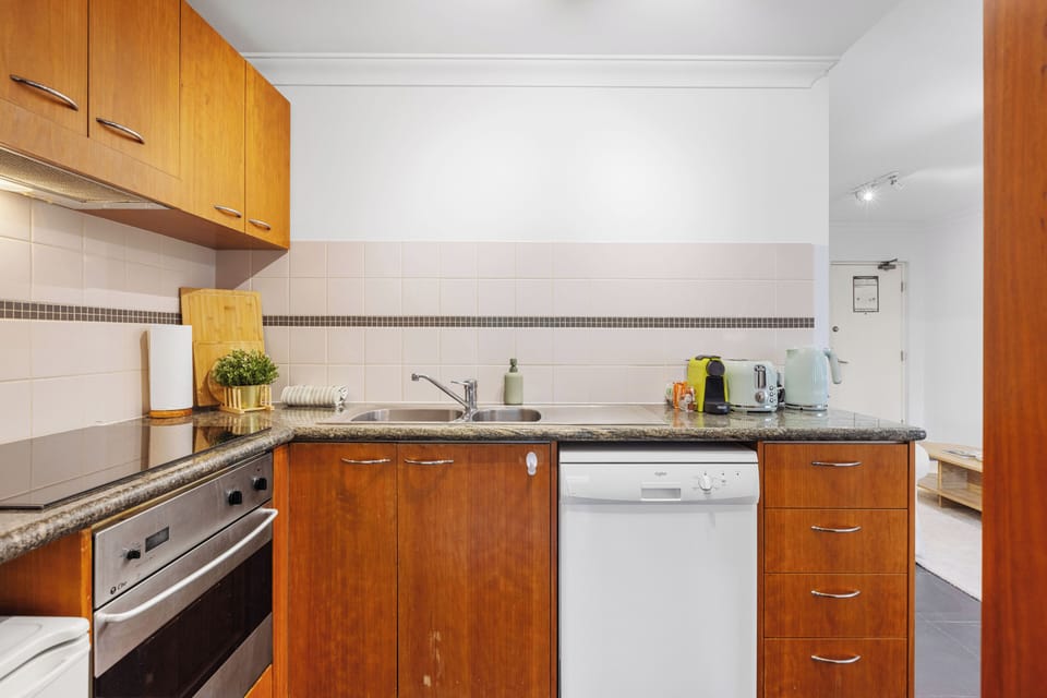Cook up a storm with ease—this kitchen comes complete with a toaster, kettle, and plenty of counter space.