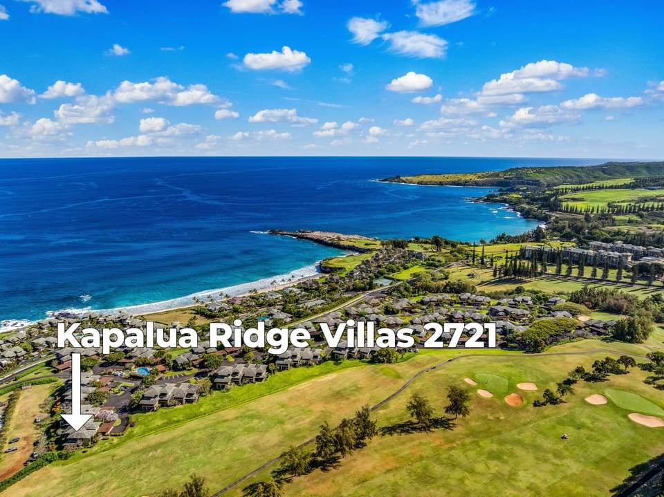 Aerial view of Kapalua Ridge Villas surrounded by lush island scenery.