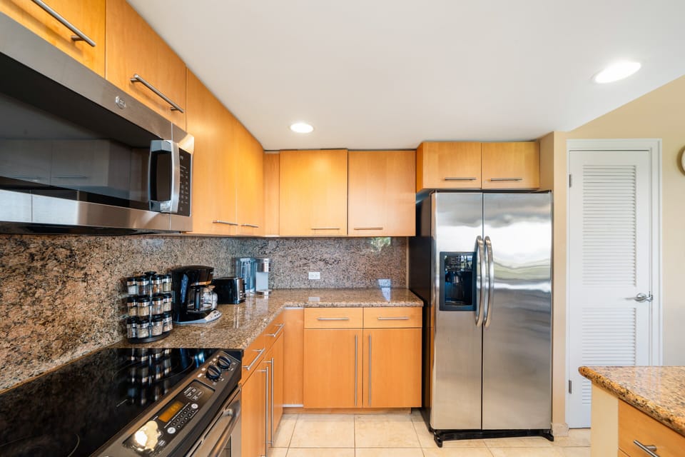 Fully equipped kitchen with stainless appliances for cooking your favorites.