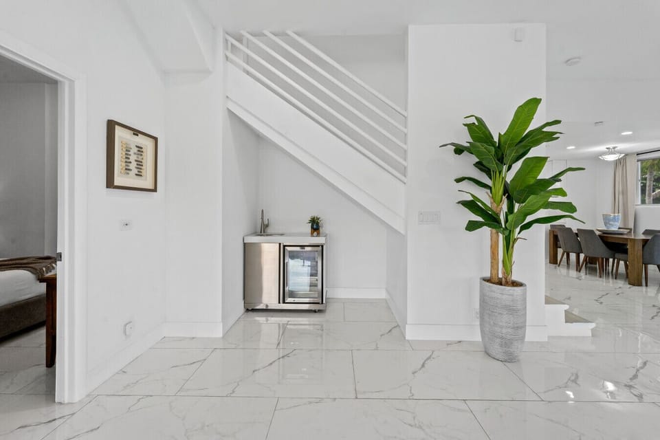 Welcoming Entry Foyer with Designer Elements and Bright Open Layout
