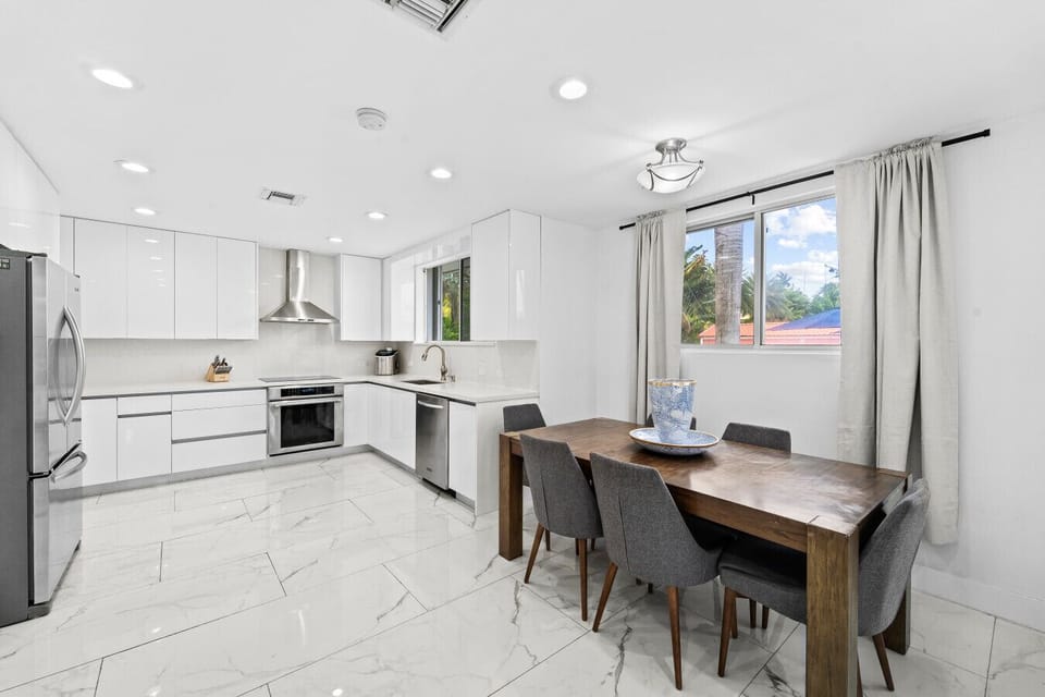 Spacious Open Floor Plan Kitchen and Dining Area Ideal for Family Meals