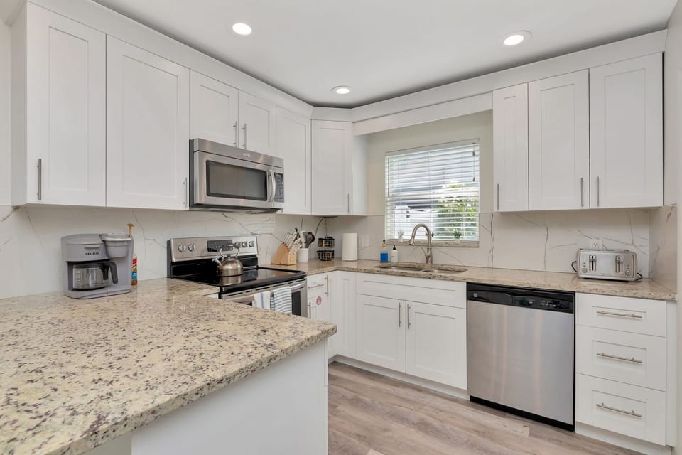 Enjoy the fully stocked kitchen for your cooking  convenience!