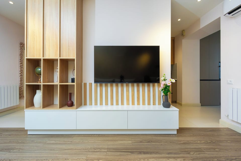 Classic Apartment, 2 Bedrooms | Living area | 50-inch flat-screen TV with cable channels