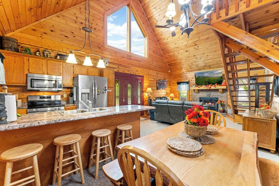 Enjoy meals together at the dining table for six plus breakfast bar seating, all within the fully stocked kitchen