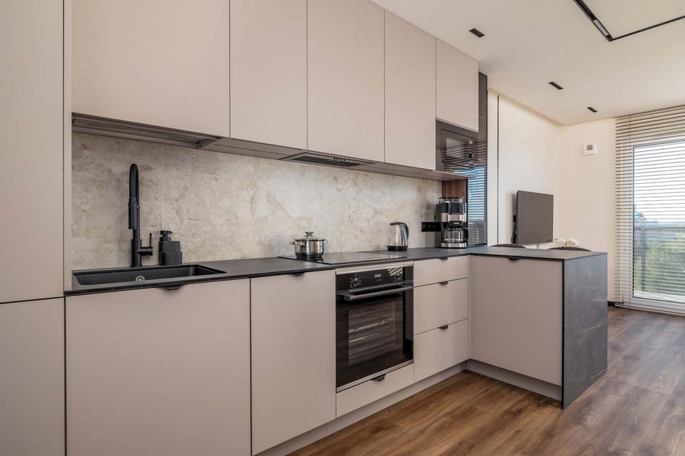 The kitchenette's practical layout maximizes space and functionality.