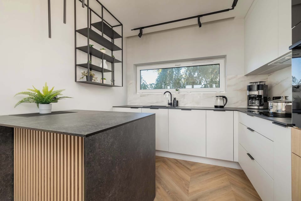 The kitchenette's practical layout maximizes space and functionality.
