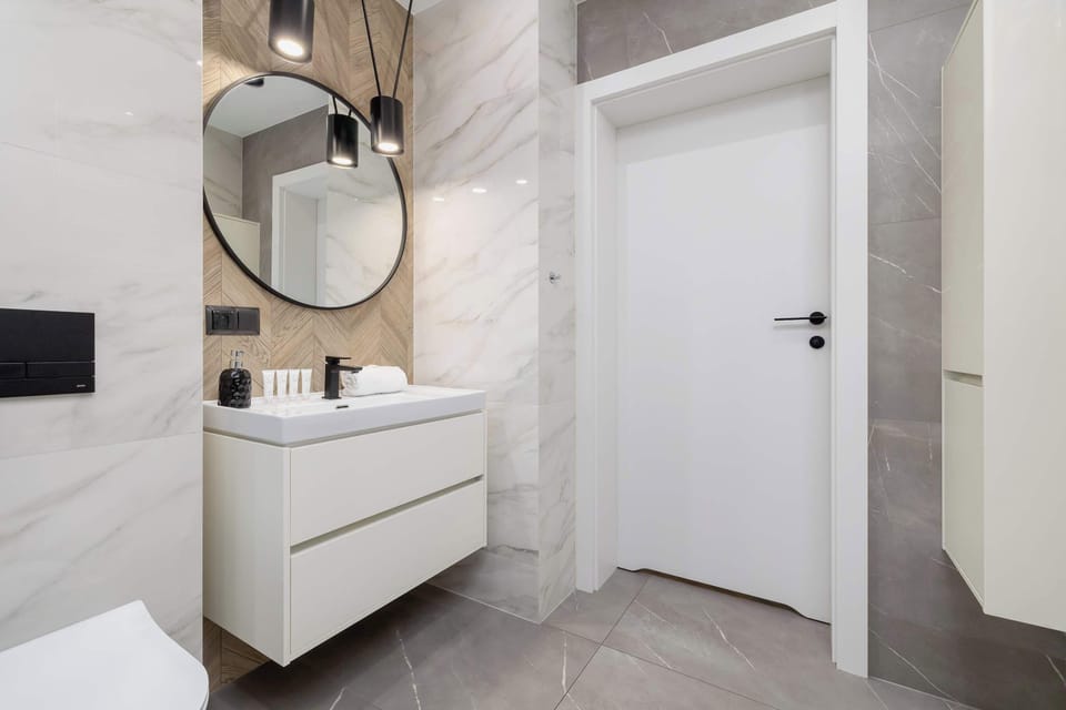 The bathroom offers a clean and functional space for your stay.