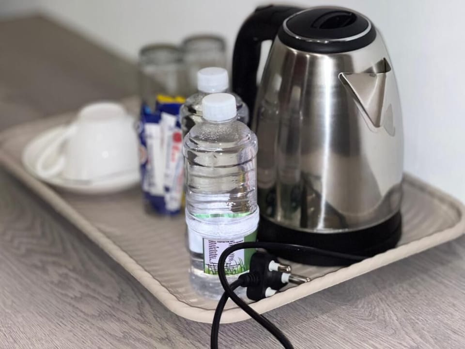 Deluxe Double Room, Garden View | Coffee and/or coffee maker