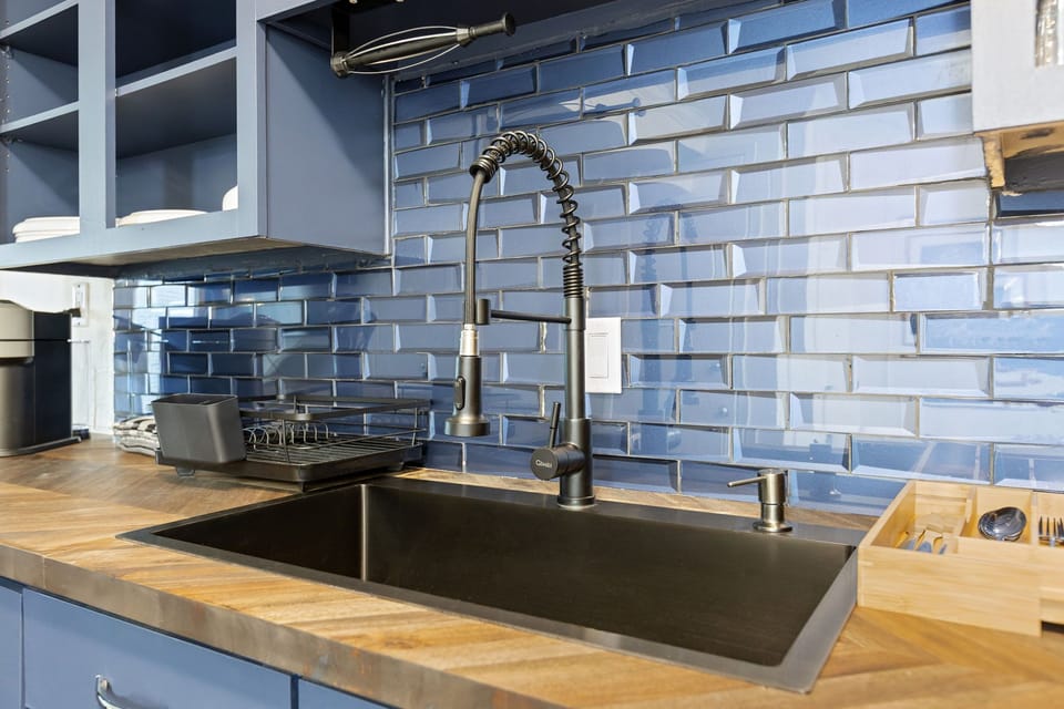 Spacious kitchen with sleek, modern appliances, fully equipped for all your 