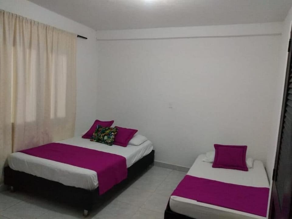 Deluxe Triple Room, Beach View | WiFi (free), bed sheets