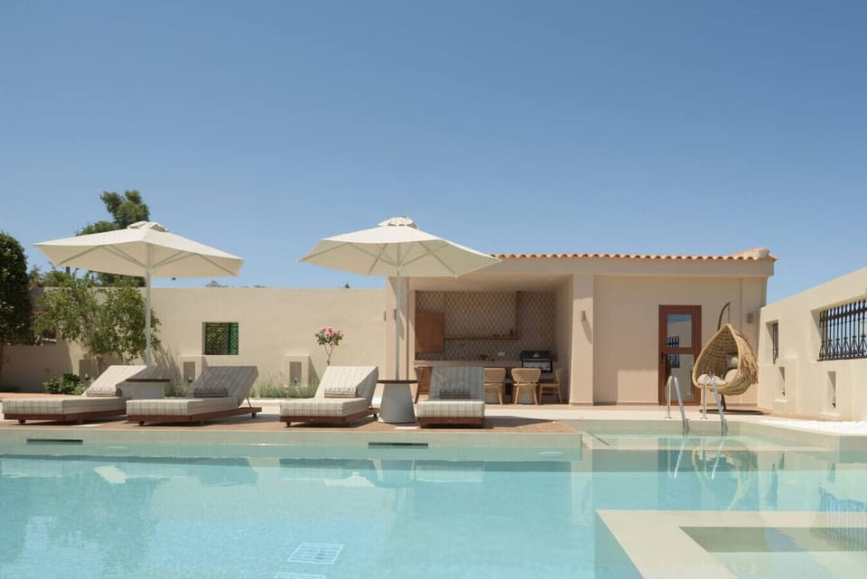 The clear blue water invites you to jump in and relax instantly.