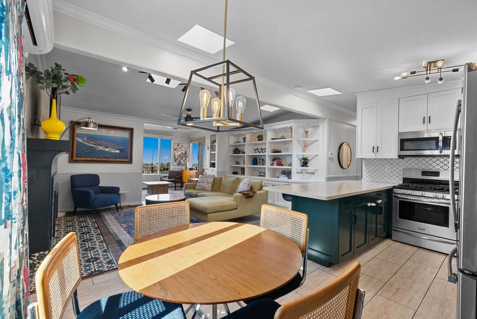 Stylish dining and living area with open flow and chic modern touches.