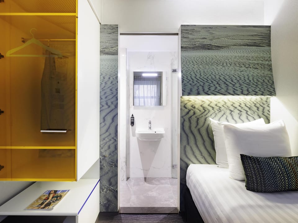 Room, 1 Twin Bed | Bathroom | Shower, eco-friendly toiletries, hair dryer, towels