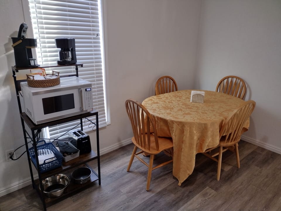 Dining area with seating for 4. Can use outdoor chairs for additional seating.