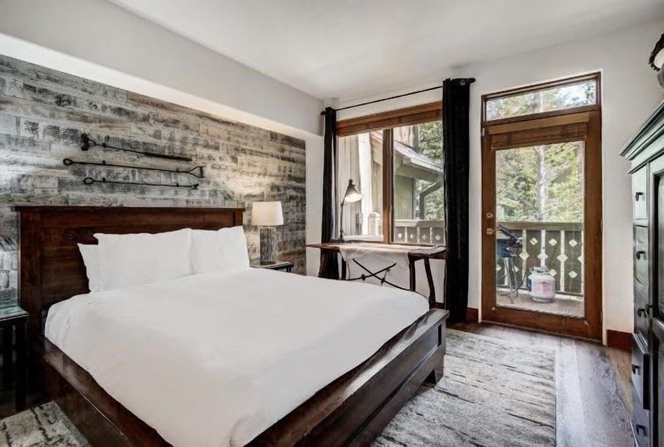 Soft textures and calming light promise restful nights, while forest views offer a gentle reminder that adventure awaits just outside.