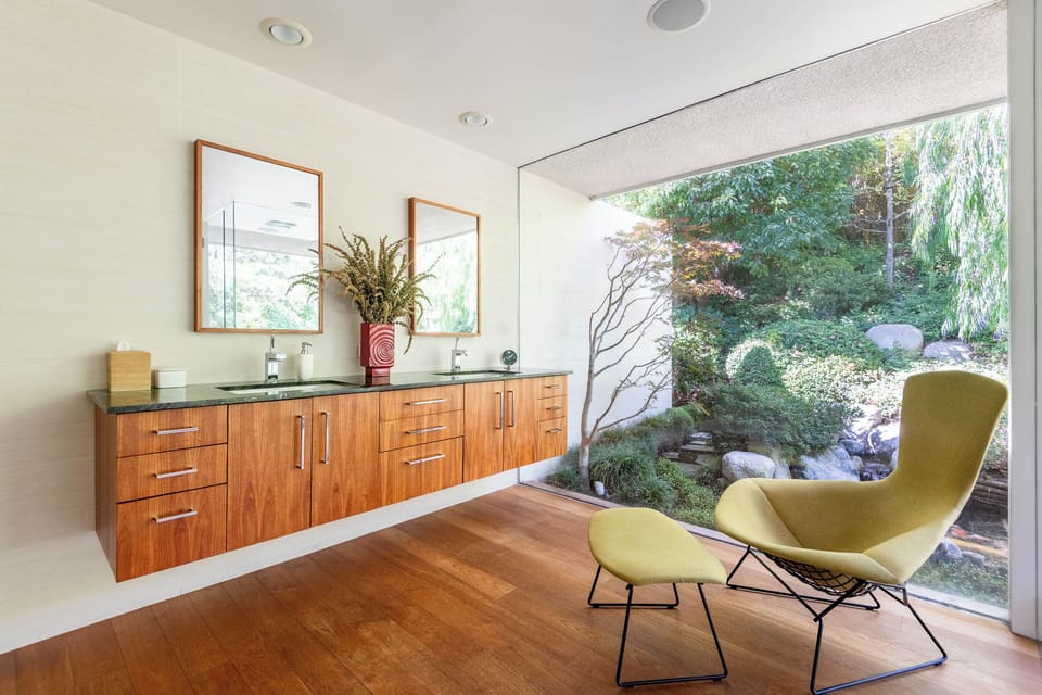 Primary bathroom with a shower overlooking a beautiful private Japanese koi pond