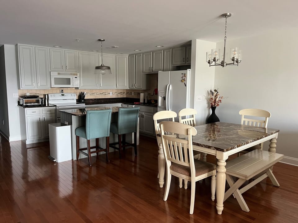 Open floor plan of kitchen, dining, and living room.