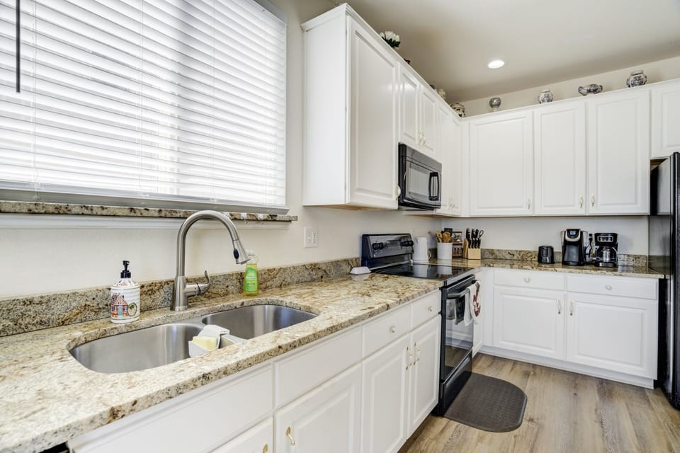 The fully stocked kitchen, complete with plenty of counter space and everything you need to prepare meals.