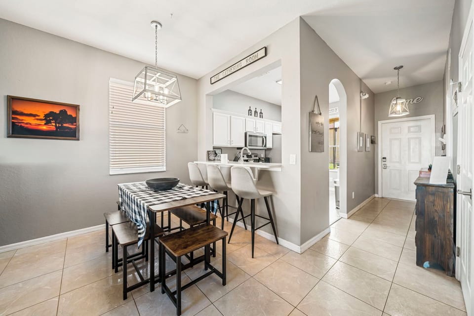 A wider kitchen view showing ample counter space and stainless-steel appliances.