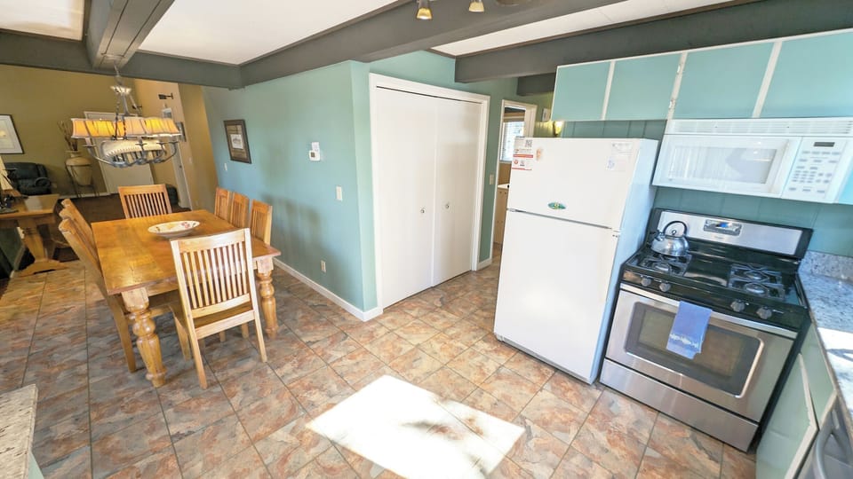 Hall leads to Main area with Kitchen, Living and Dining