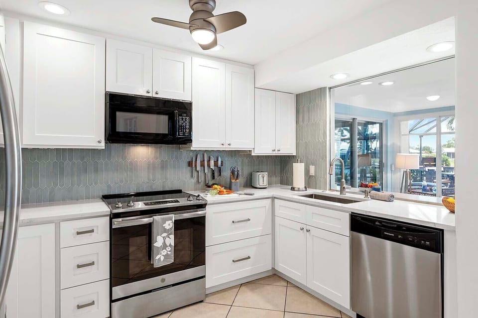 Modern Kitchen with Amazing Views of the Pool and Lanai