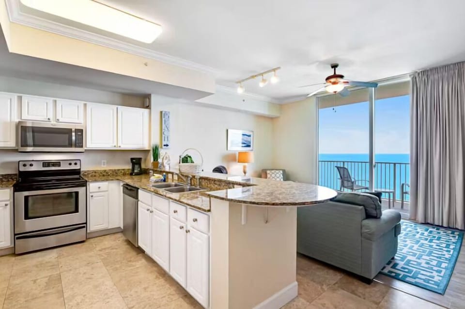 Condo, 1 King Bed with Sofa bed (Tidewater 3006) | Private kitchen | Oven, cookware/dishes/utensils