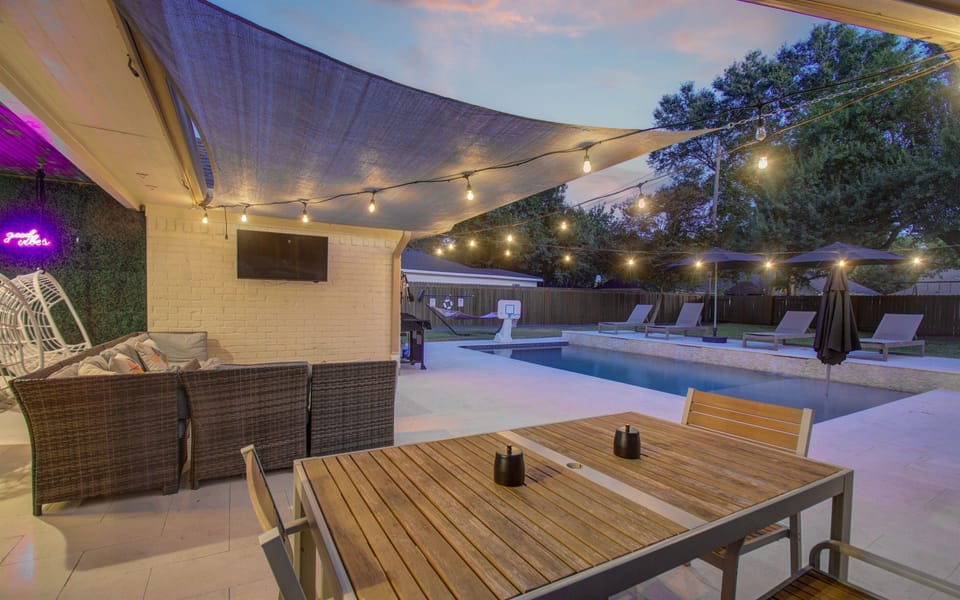 Enjoy magical nights by the pool under string lights