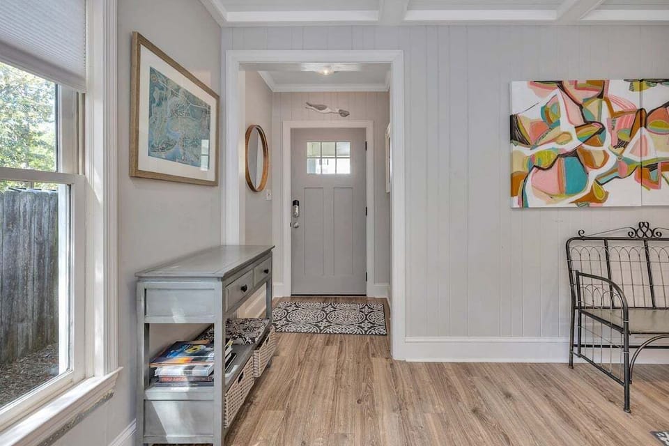 Entryway with storage bench and front door