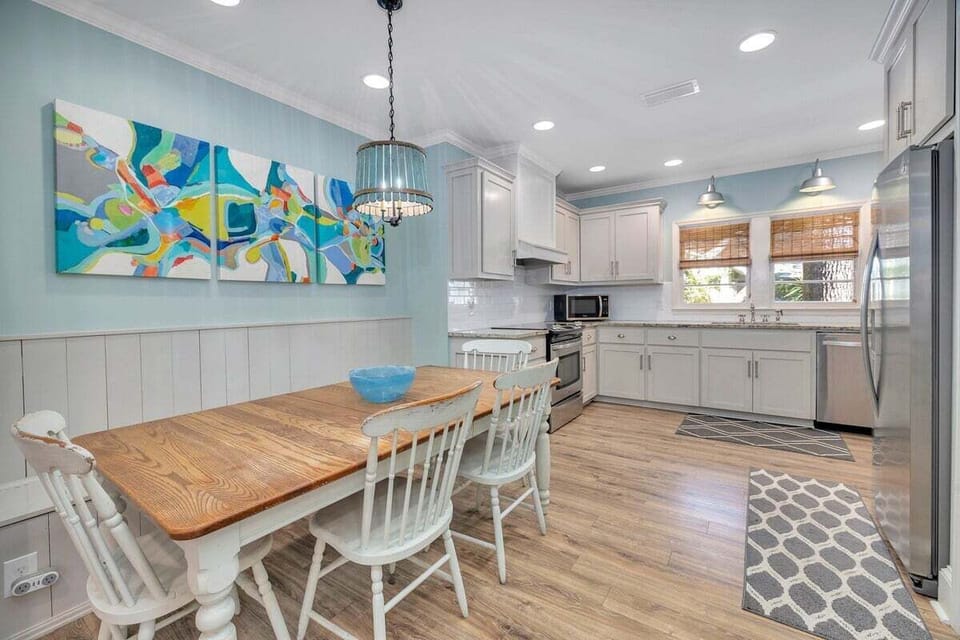 Open kitchen and dining space seating four