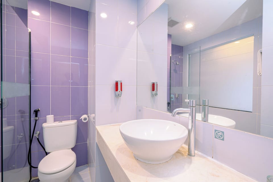 Shower, hair dryer, slippers, towels