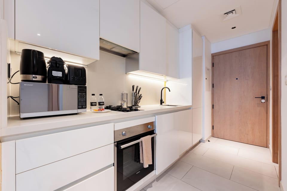 Deluxe Studio, Balcony, City View | Private kitchen | Espresso maker, electric kettle