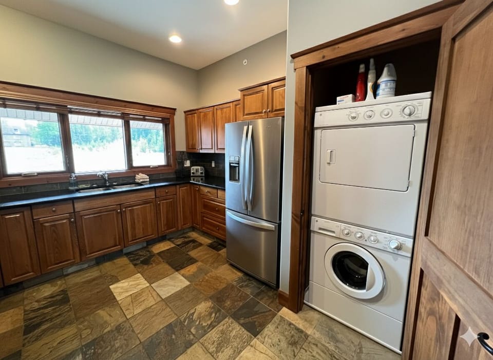 A full kitchen with modern appliances, stocked with everything you'll need to feed the crew. Full laundry.